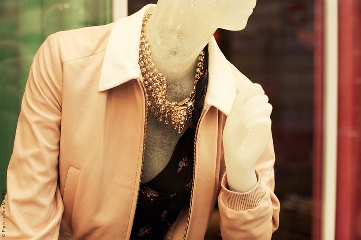 Shopping on a budget in Paris is possible if you go to second-hand stores, where you can pick up some great finds like this cream jacket and old necklace.