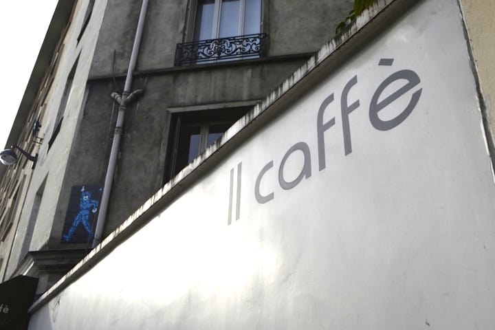 Outside affordable Italian restaurant Il caffè in Paris' business district.