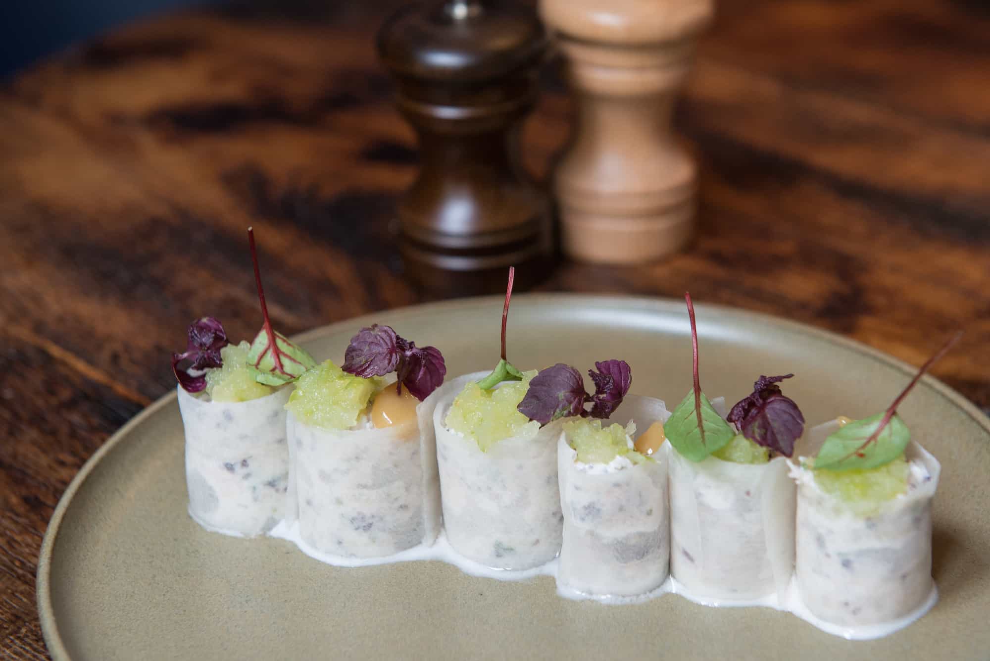 A favorite restaurant in Paris for fresh fish, Belle Maison serves original dishes like these delicate ceviche fish rolls.