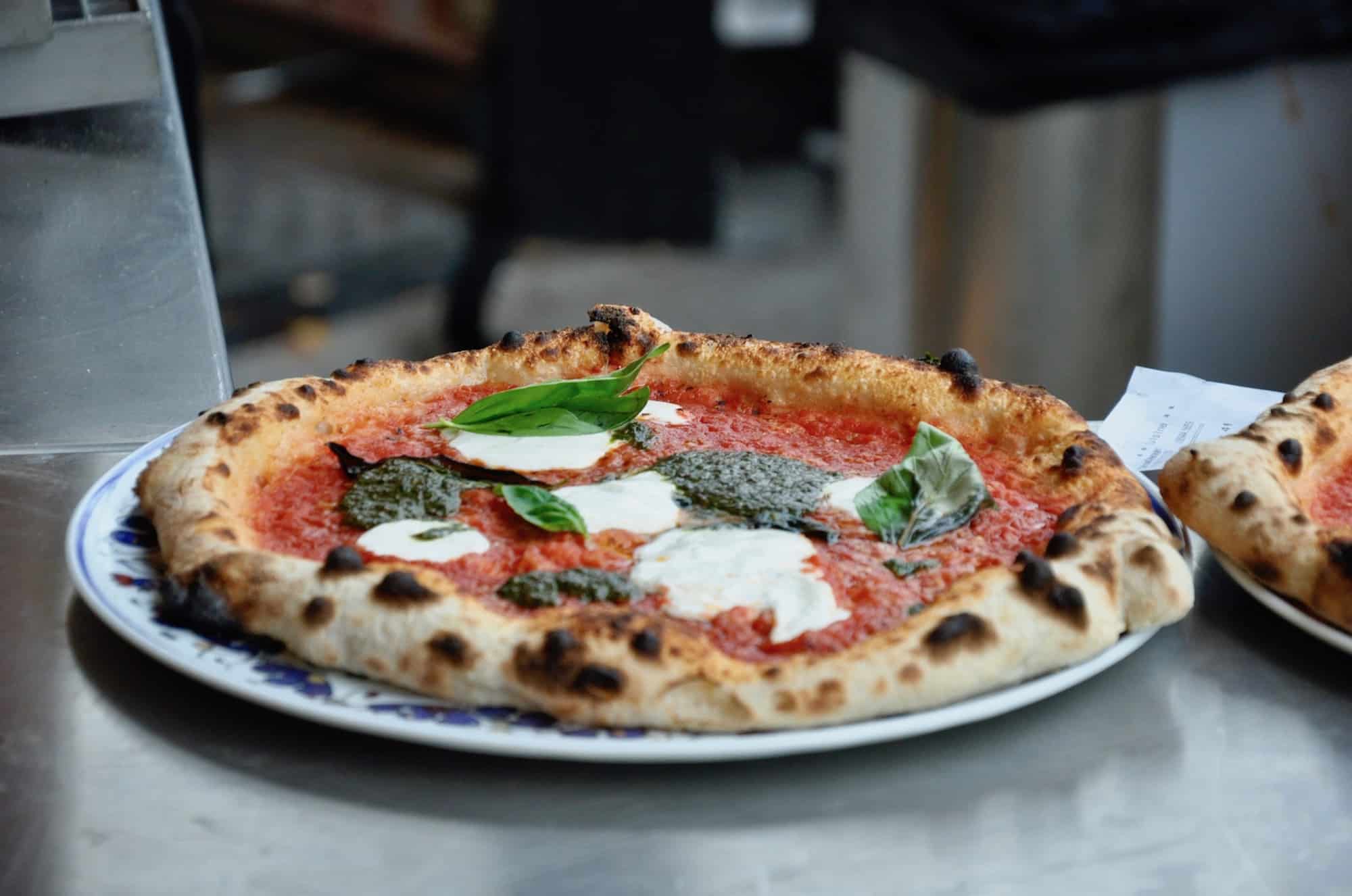 Paris restaurant, Big Mamma Group's La Felicita, serves delicious stone-baked pizza and our favorite is the mozzarella and basil.