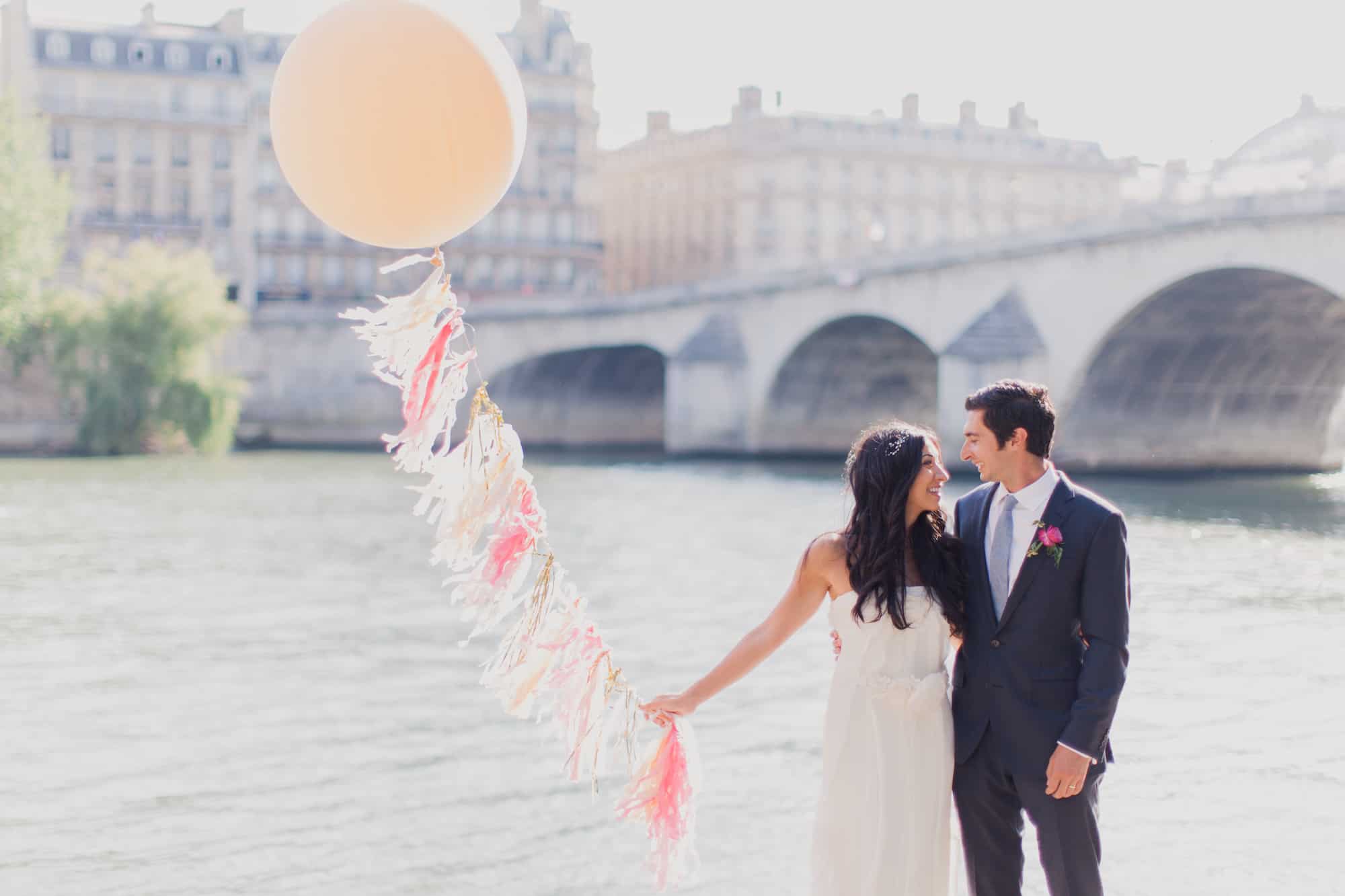 Paris' Instagrammable spots are aplenty, including the River Seine for this newly married couple holding a balloon.