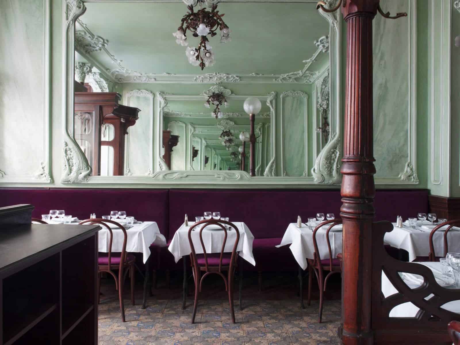 Bouillon Julien restaurant in Paris comes with spectacular Art Nouveau interiors and classic French food for travelers on a budget.