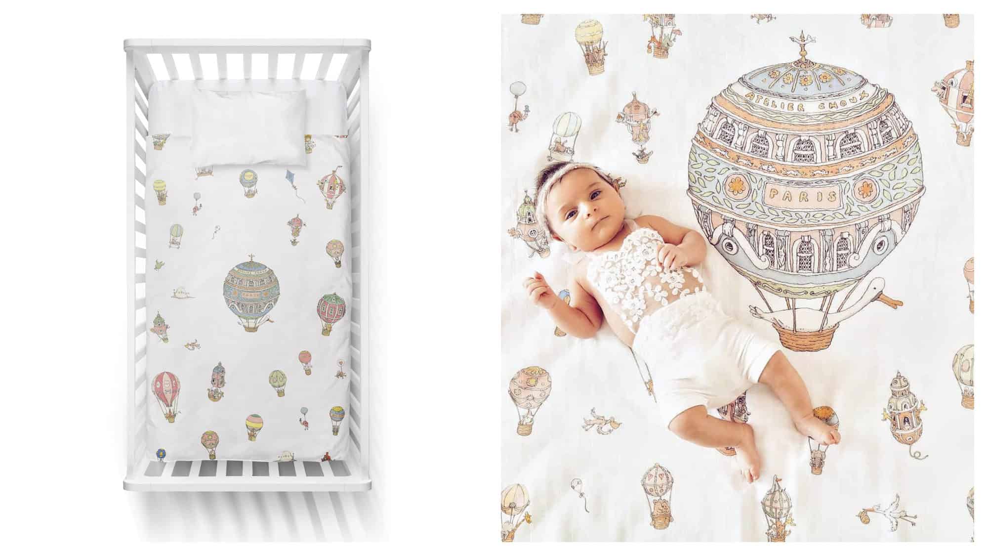 A crib with a patterned mattress with hot air balloons on it from Atelier Choux (left). A baby lying on a hot air balloon blanket (right).
