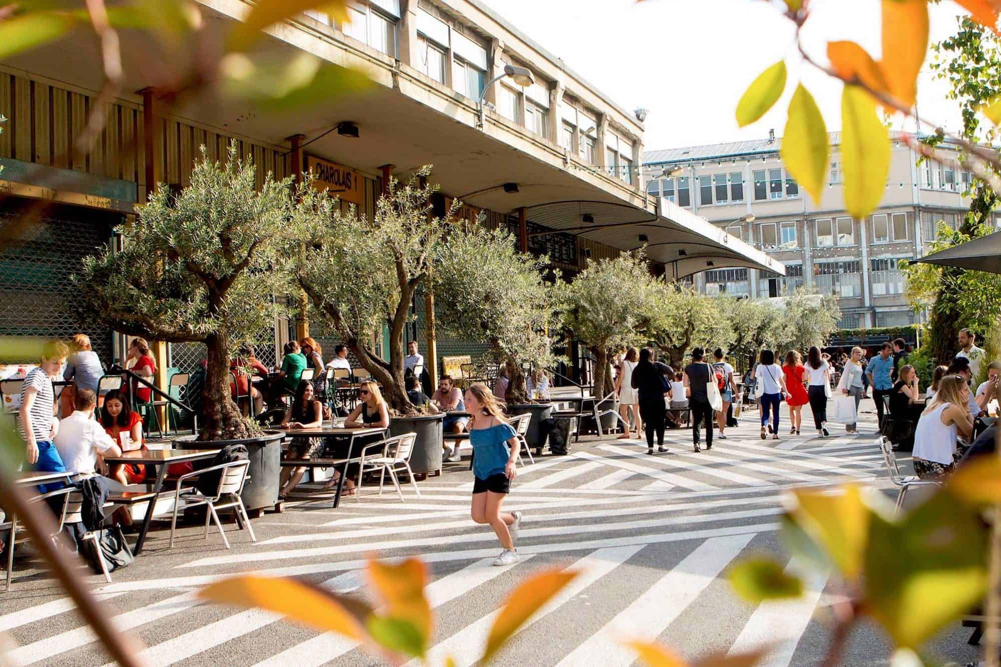 Ground Control is one of our favorite terraces in Paris in summer as it has a large outdoor space with potted olive trees and plenty of food options.