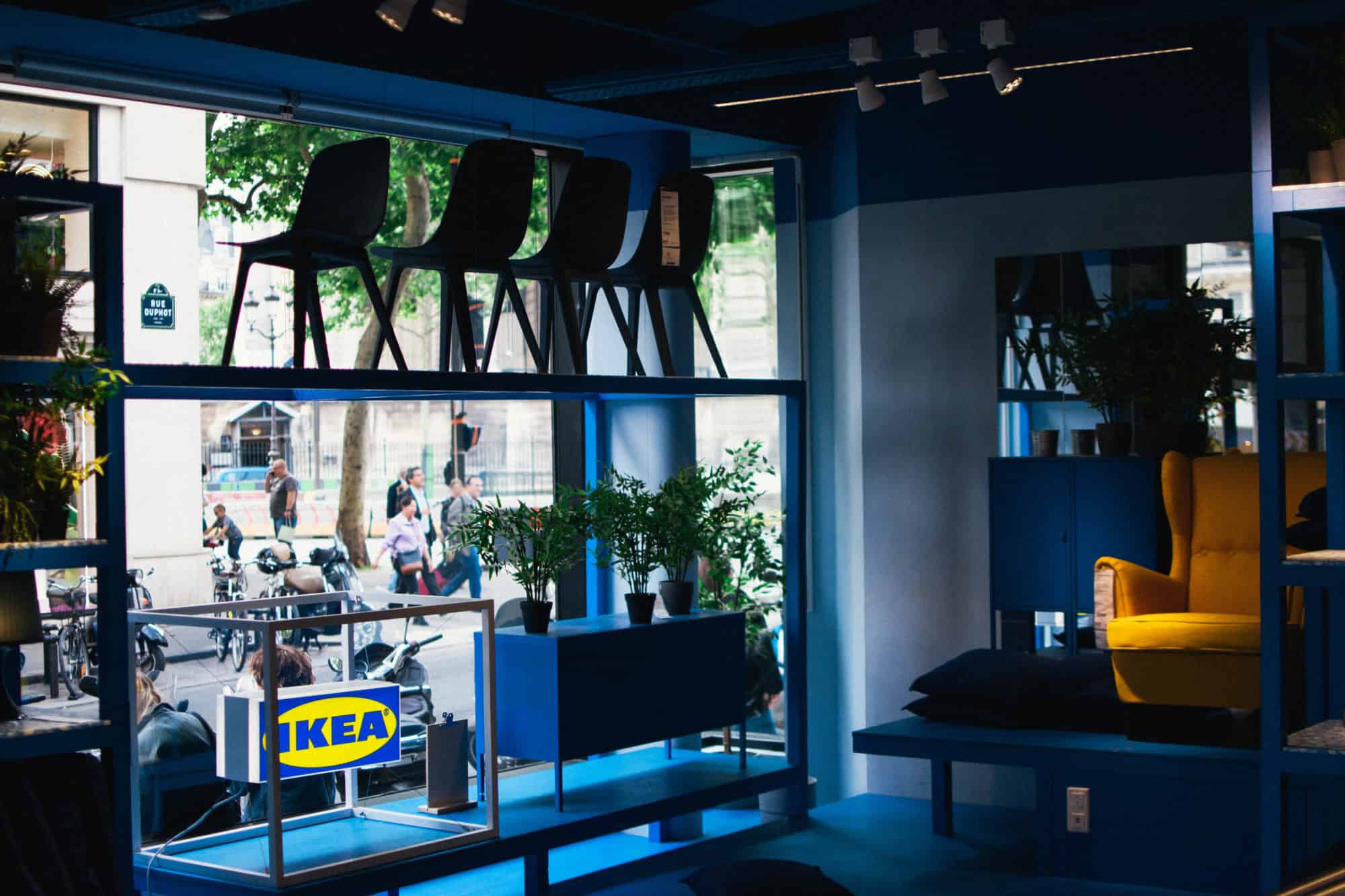 A blue and yellow furniture display in IKEA Paris La Madeleine