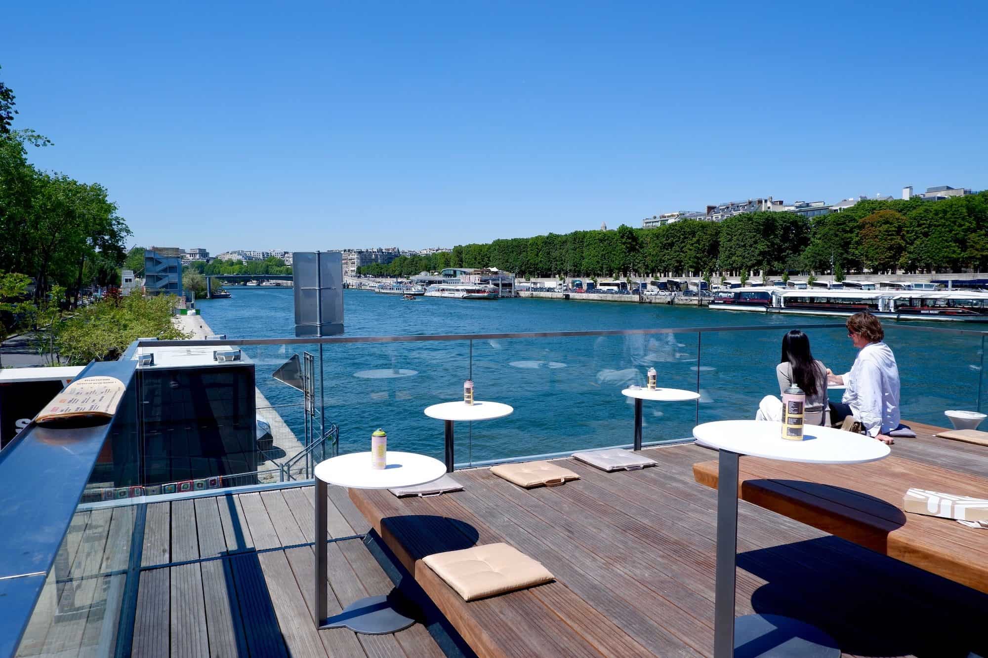 View of the River Seine in summer from the terrace of Fluctuart art center in Paris.