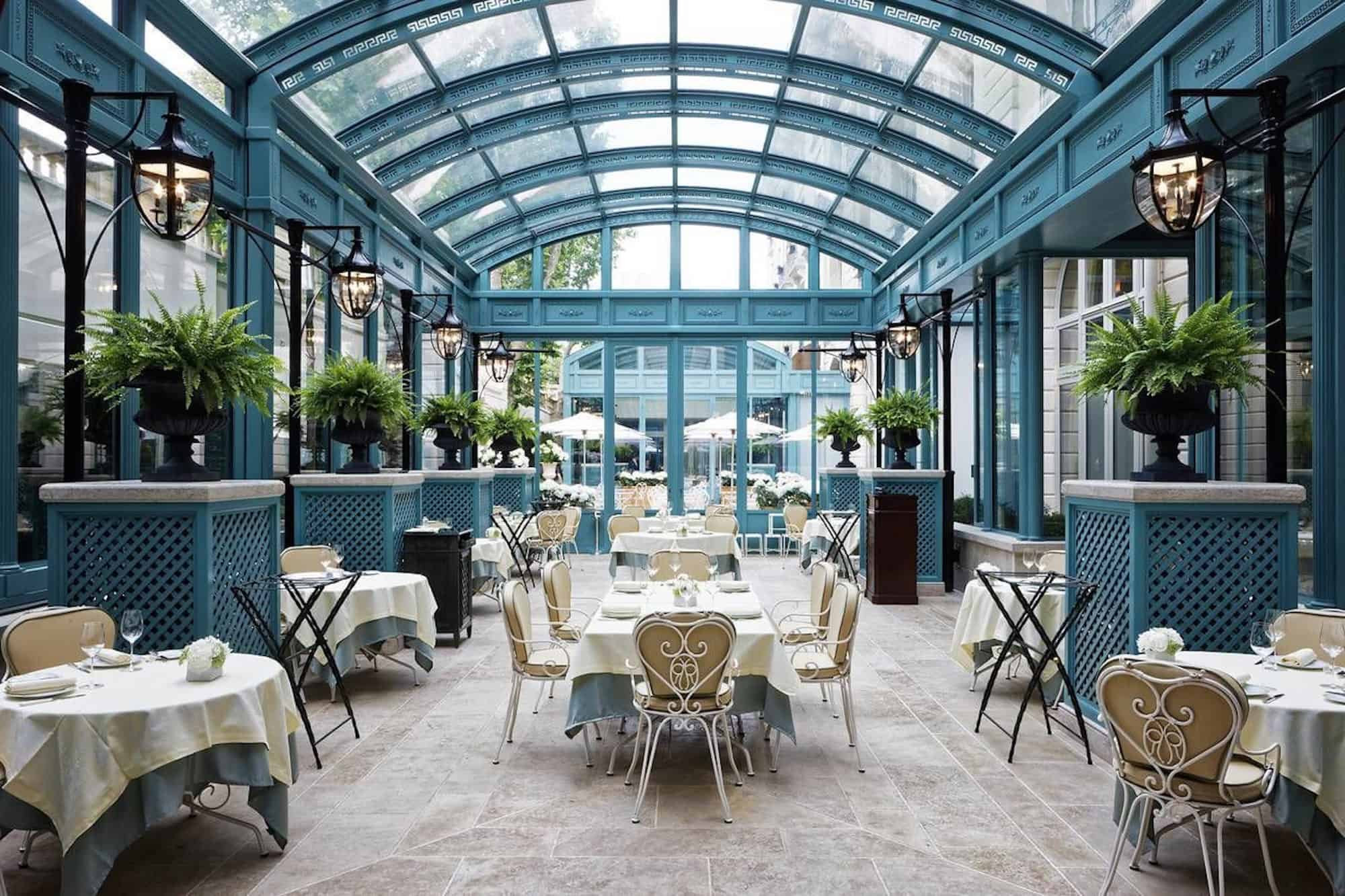 The glass roofed Bar Vendôme at the Ritz Hotel Paris, a perfect spot for dining in the winter sun.