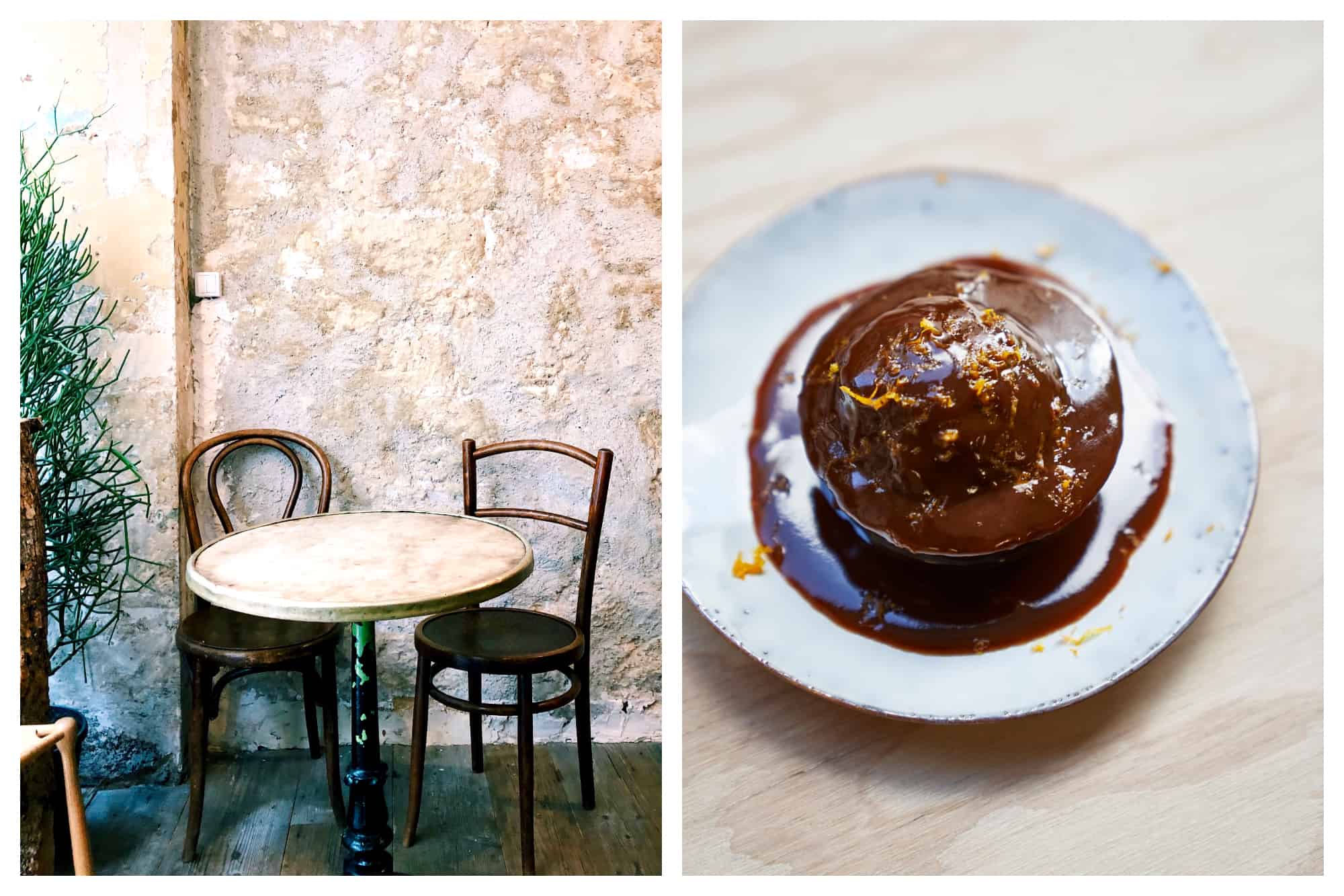 A table and chair with an exposed stone wall (left) and a sticky toffee and chocolate cake (right) at Dreamin Man coffee shop in Paris.