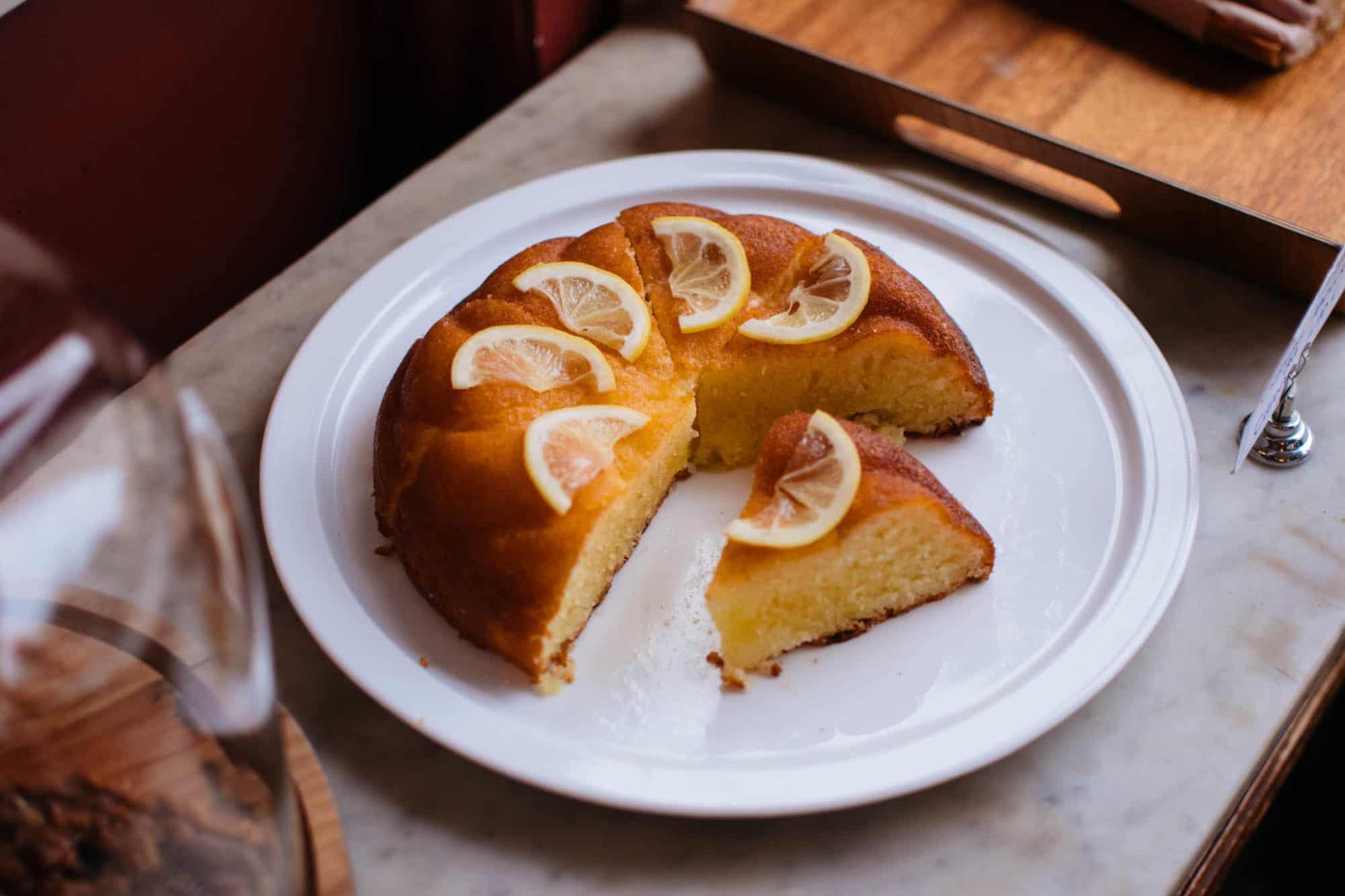 Spongy lemon cake at Fontaine de Bellville café, located in the 10th arrondissement of Paris.