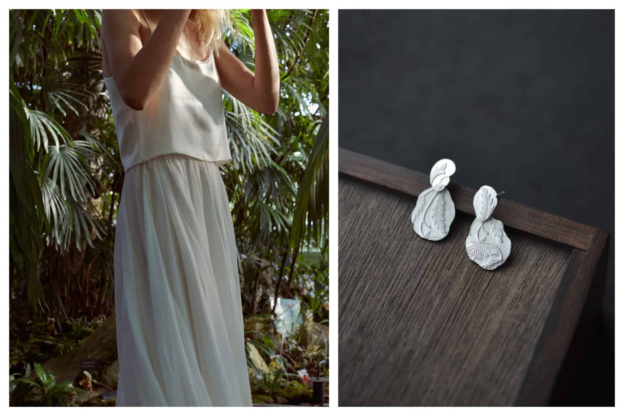 Left: A woman wearing a long white dress stands in front of green plants, Right: A pair of hand-made silver earrings sit on a wood table
