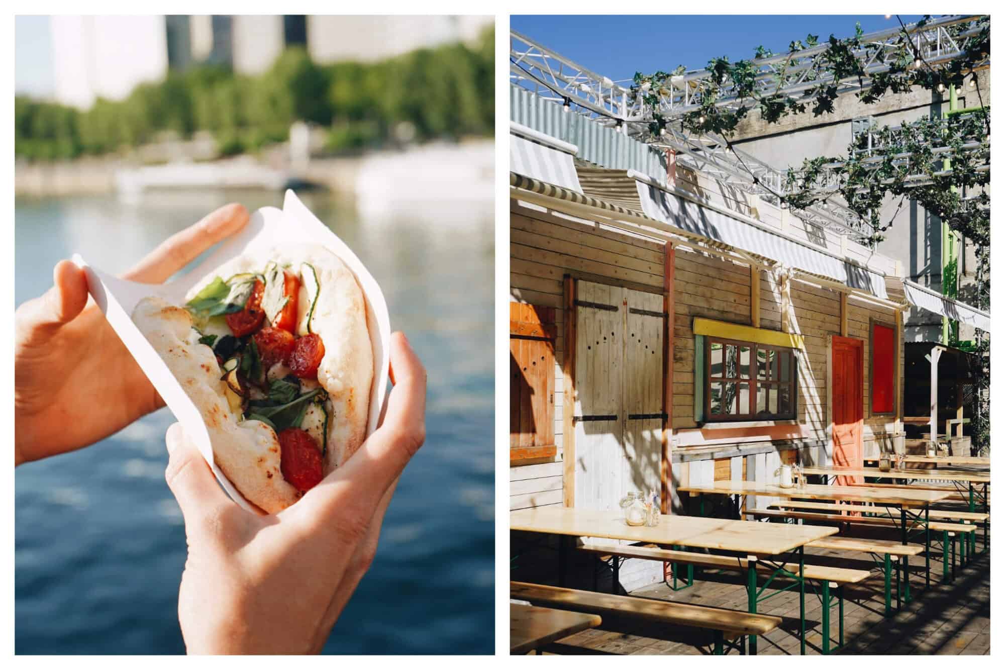 Left: a person's hands holding a pita bread stuffed with tomatoes and basil with the Seine in the background. Right: the wooden terrace with wooden bench seats at Wanderlust Street Food, a bar in Paris.
