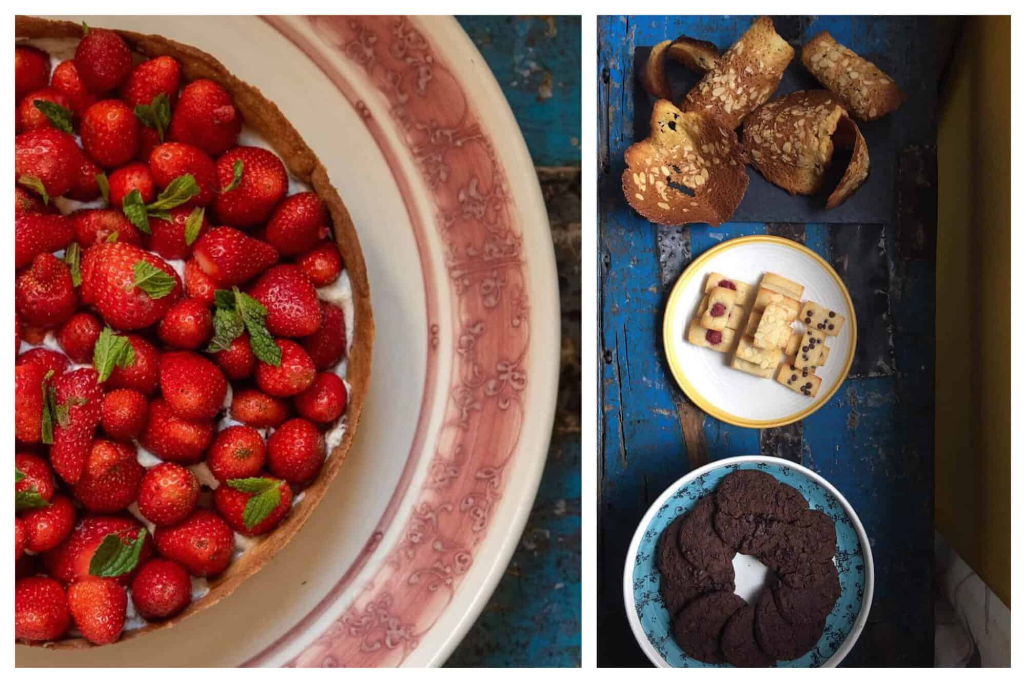 Left: An overhead shot of a bright red strawberry tart sitting atop a large white and red plate, Right: An overhead shot of various desserts and pastries, including chocolte cookies and almond pastries. 