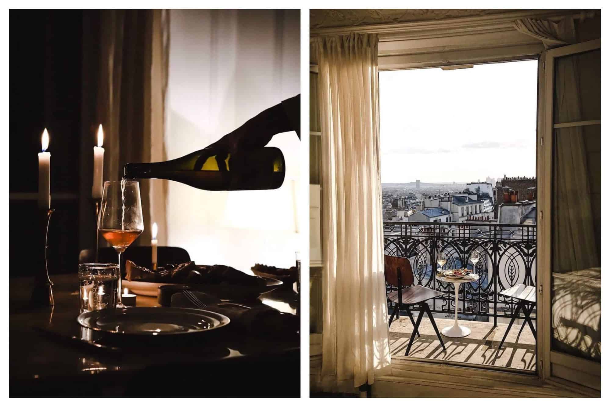Left: a dimly lit room with a table with plates, candles, and a wine glass. Someone is pouring a bottle of wine. Right: View of a room with a balcony overlooking Paris. There is a table with two glasses and food and two chairs.