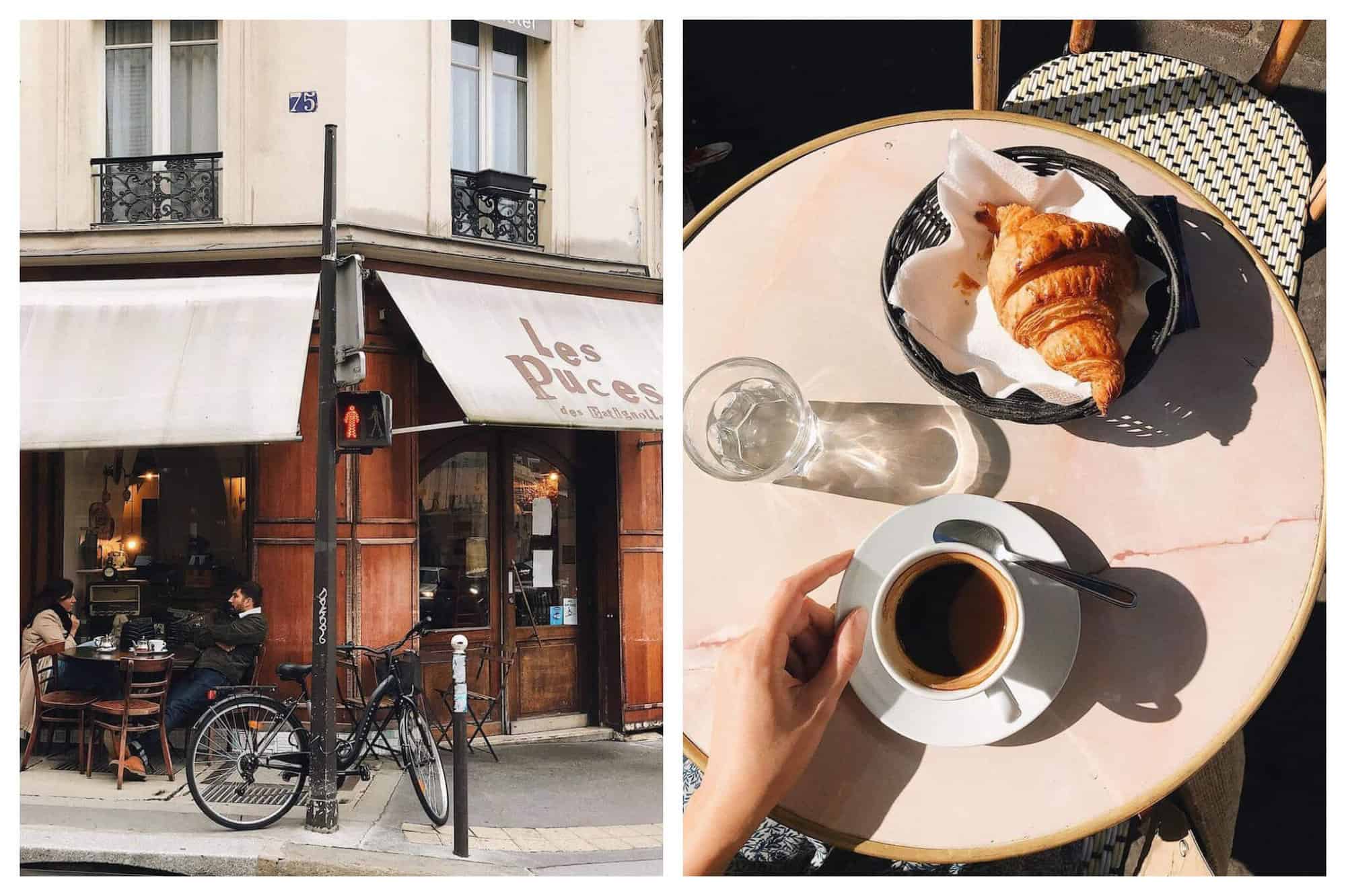 Left: The exterior of a café in Paris. It is covered in wood and has a white awning with the name of the café written in dark letters, "Les Puces." There is a table with two people sitting at it and a bike parked outside. Right: an aerial view of a table at a café in Paris. The table is light pnk and there is a croissant in a basket, a glass of water, and a coffee with someones hand to the left of it visible.