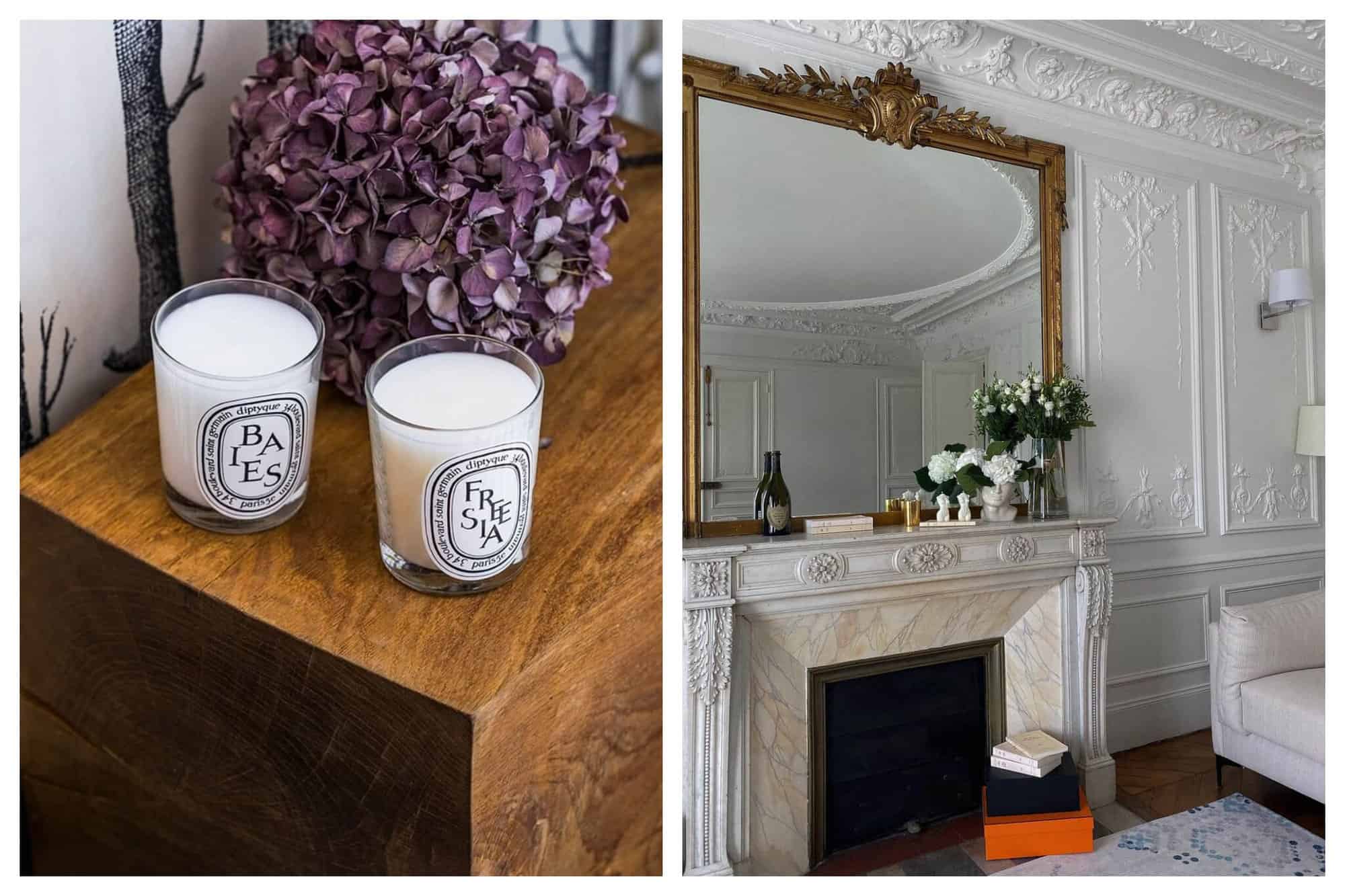 Left: Two diptyque candles (Baies and Freesia) are pictured on a wooden surface next to some dried purple flowers. Right: A marble fireplace within a white room is pictured, with some flowers and candles resting on the mantelpiece and a large gold mirror behind that. 