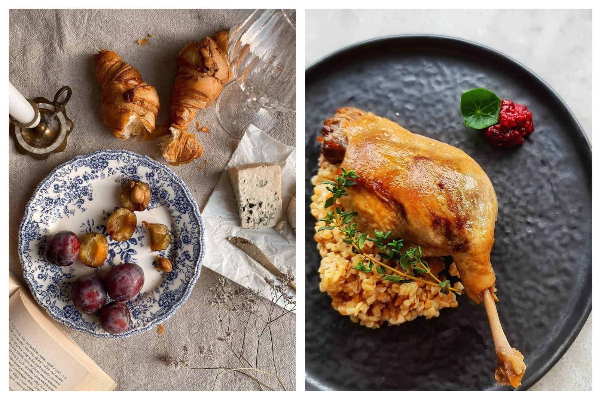 Left: A picture of a table setting with croissants, plums in a vintage plate, cheese, a glass, a white candle, a book, and some flowers. Right: A famous French dish called Confit de Canard or Duck Confit is pictured in a slate black plate, garnished with risotto, thyme, and cranberry.