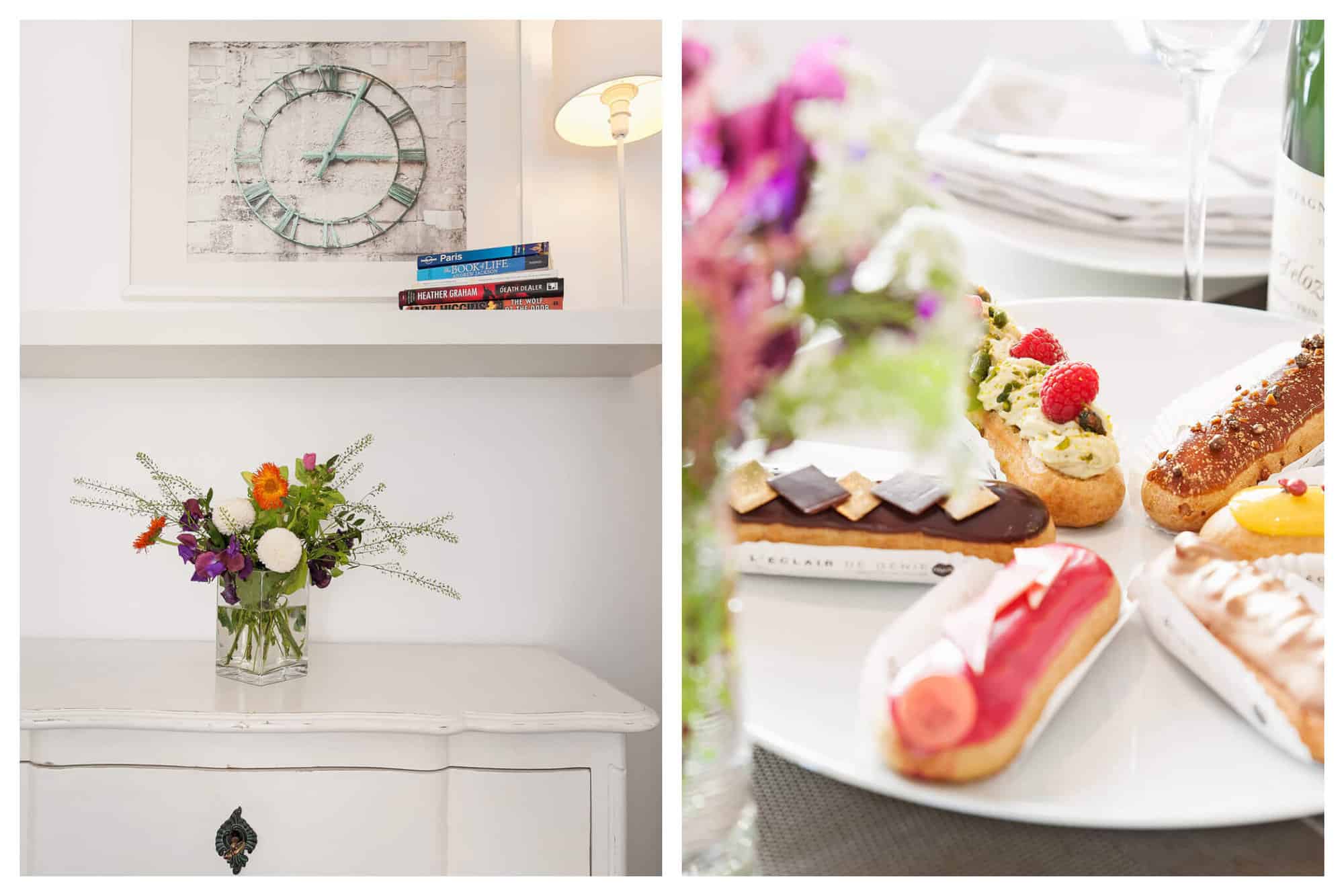 Left: a vase of flowers on a chest of drawers with a shelf above. On the shelf are books and a lamp, and above is a framed picture of a clock. Right: a plate of eclairs on a table with a vase of flowers in the foreground and a bottle of wine and wine glass in the background. 