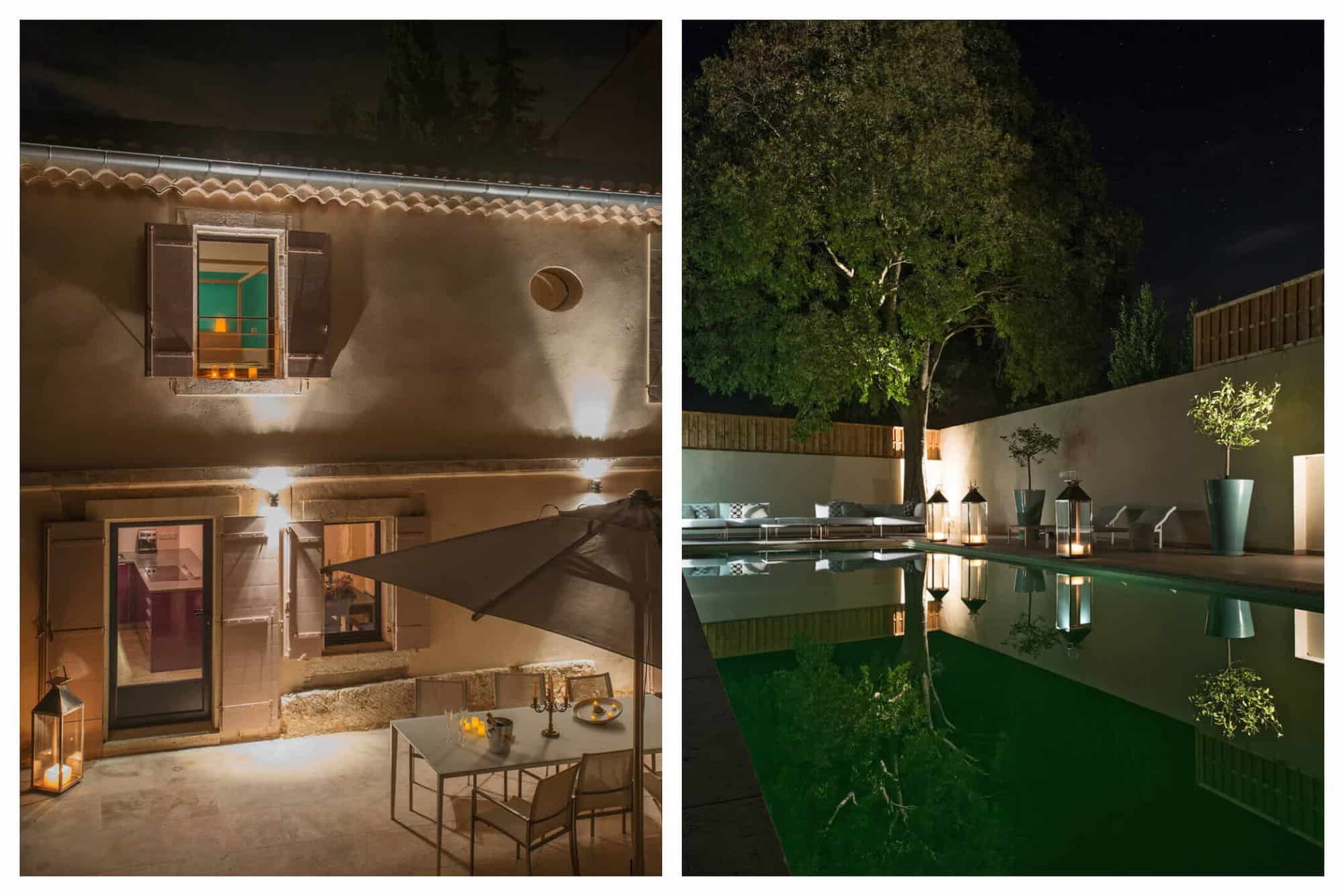 The exterior of Fontvieille Family Retreat is lit up at night showing the terrace and still pool. 