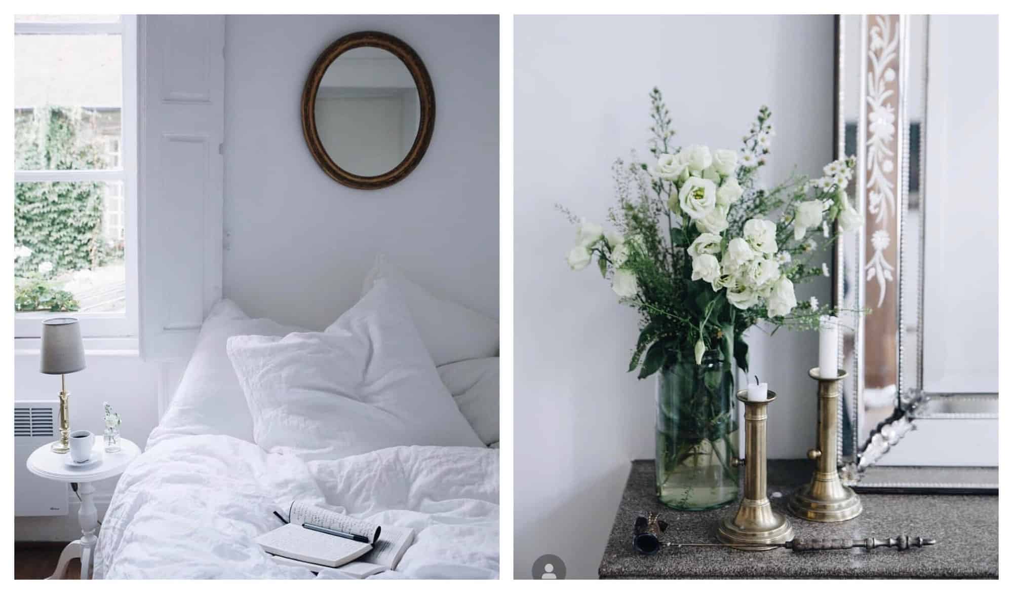 Left: A white linen-covered bed is pictured next to a light-filled window inside The Cook's Atelier's pied-à-terre. Right: Two brass candle holders are sat to the right of a vase filled with white flowers. 