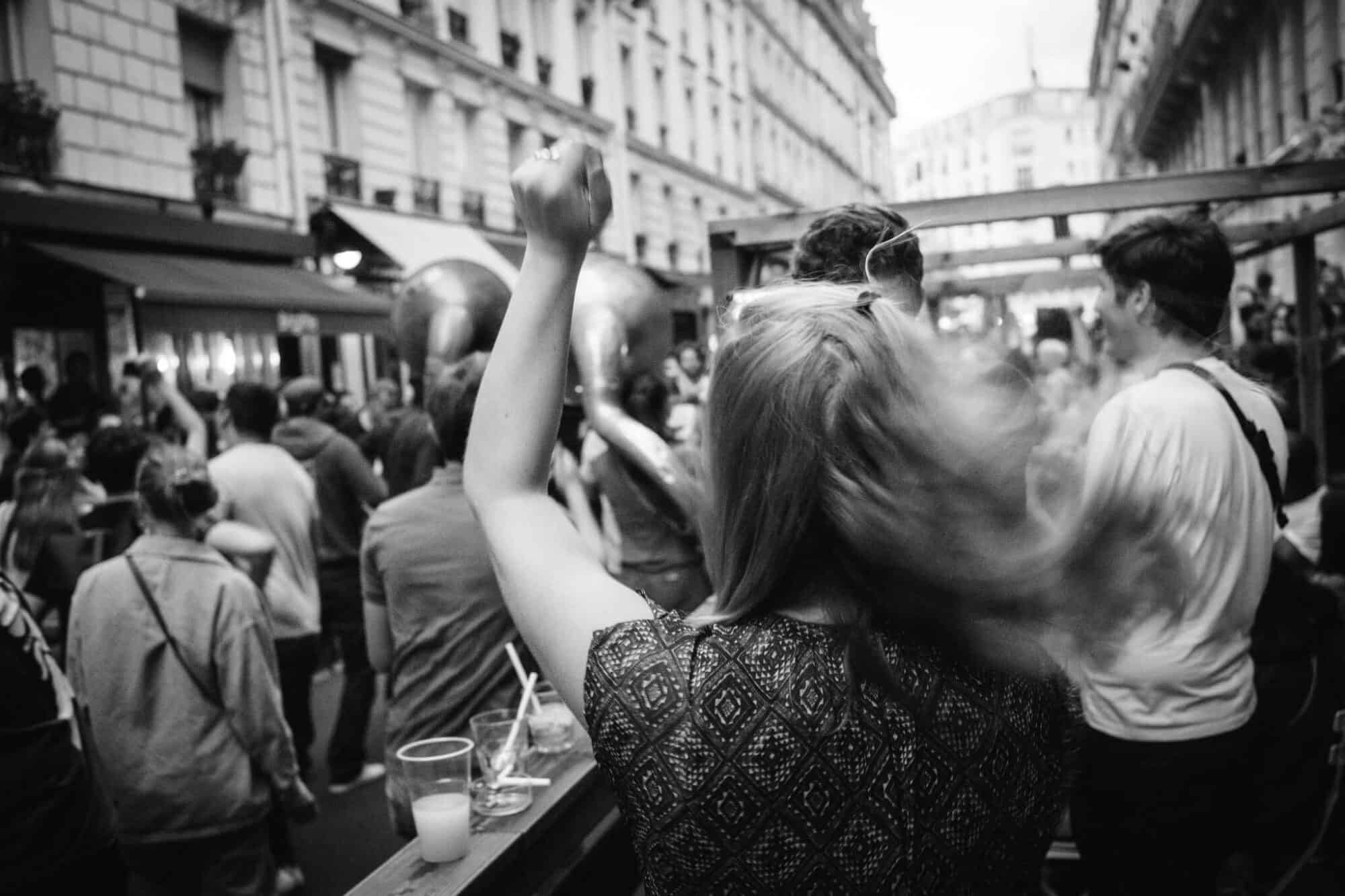 People dancing on the streets of Paris during the annual Fête de la musique.