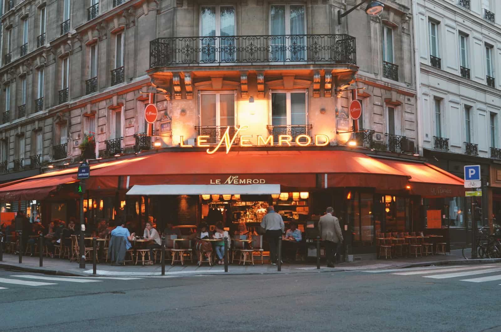 The facade of Le Memrod restaurant at sunset.