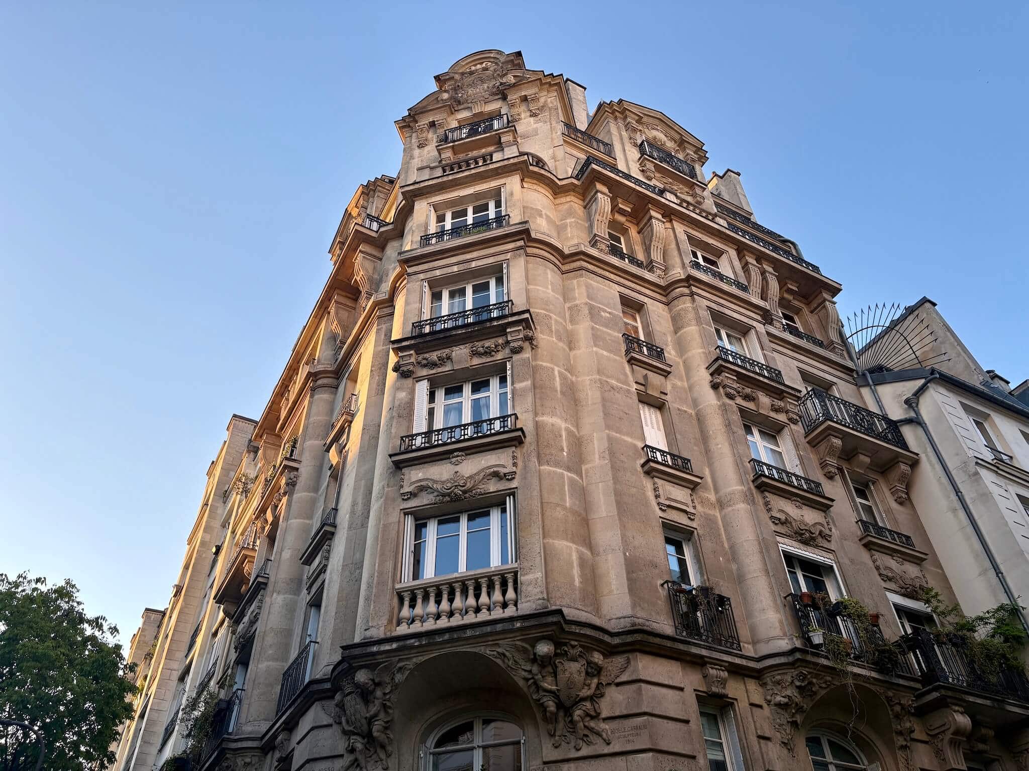 Haussmanian building on a street corner.